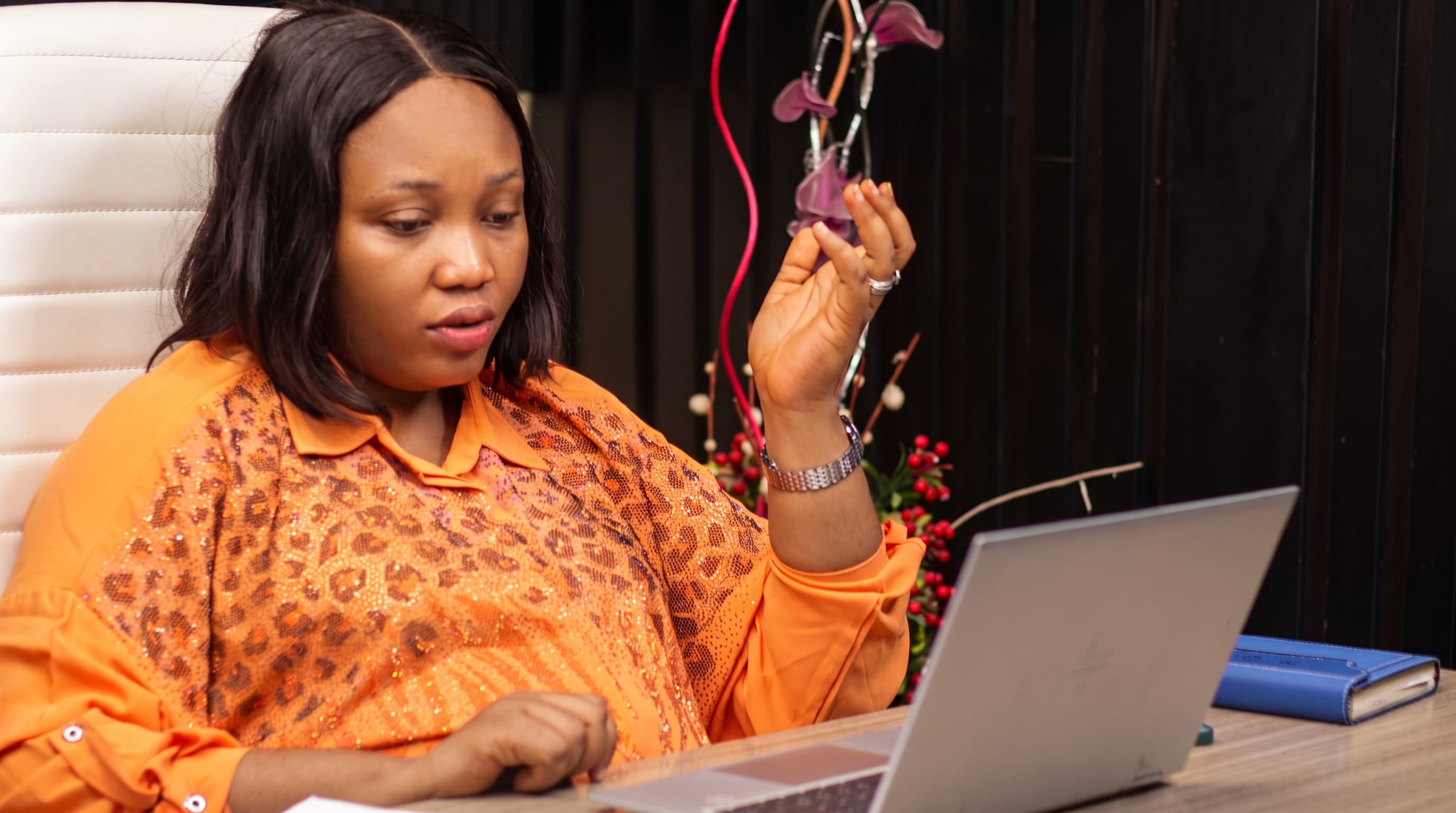 Linda Chikaodi Austin working at her desk